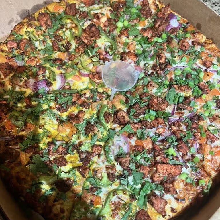Savor our pesto pizza